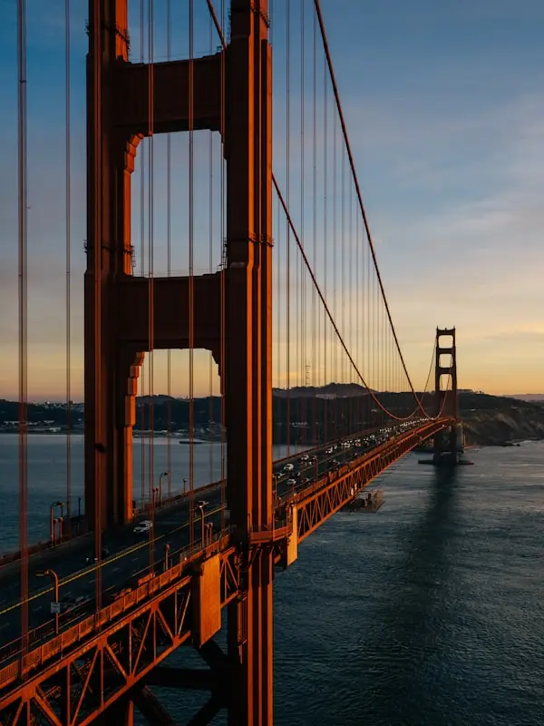 A view of the golden gate bridge at sunset